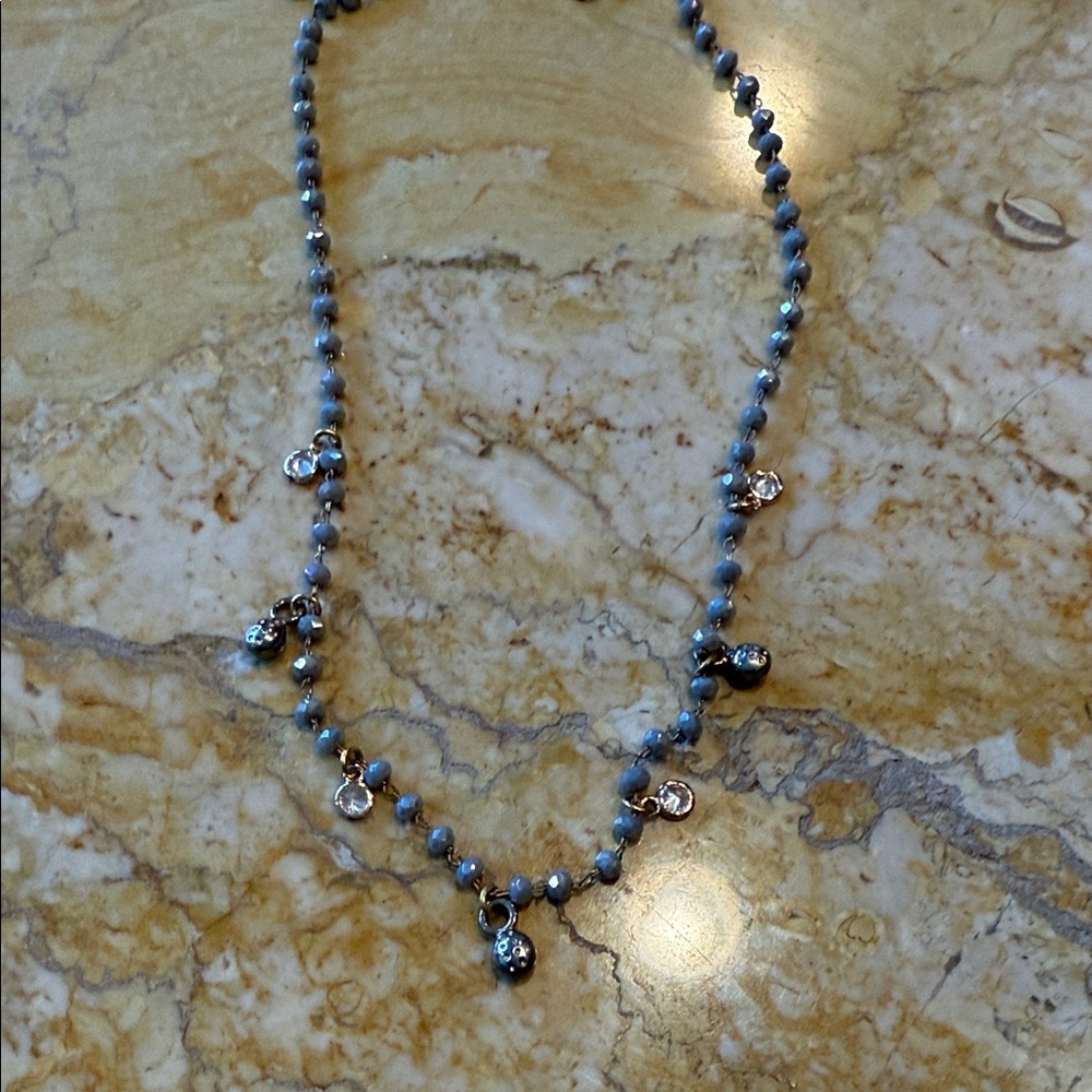 Elegant Beaded Necklace with Charms
